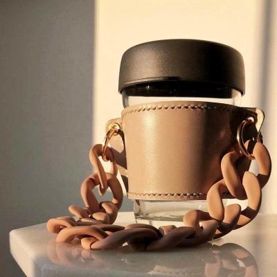 China Sustainable REUSABLE Leather Coffee Cup Sleeve Holder With Acrylic Handle Alloy Large Chain Strap for sale