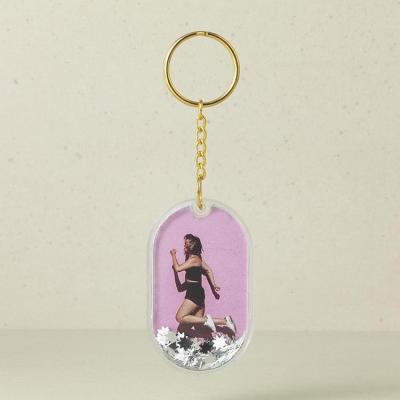 China Key Own Key Chain Premium Quality Photos Fits Two Design Oval Plastic Liquid Glitter Frame for sale