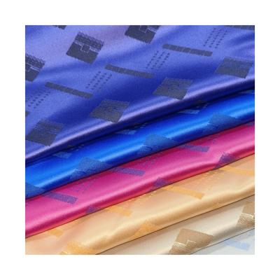 China Shrink-Resistant stock shinny fabric wholesale africa market TR jacquard  for garment for sale