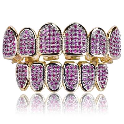 China Hot Sale Hiphop Fashion Hiphop Hitter Iced Out Diamond Micro Pave Pink CZ Halloween Vampire Teeth Grillz for sale