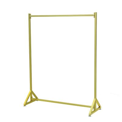 China Heavy Duty Wall Sleeve Clothing Rack Metal Boutique Furniture Clothing Garment Display Gold for sale