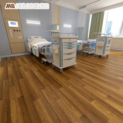 China Minimalist Education Room Medical Nursing Indoor Use Tiles Eco Plastic Wood Grain Adhesive Vinyl Flooring Heterogeneous Roll for sale