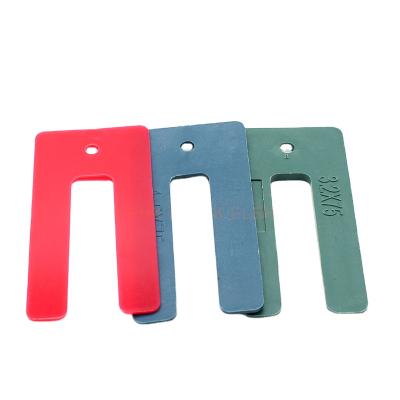 China Modern High Quality Plastic Window Packer Horseshoe Horseshoe Packers Mix Window Packers for sale