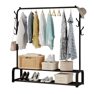 China Bathroom Garment Rack Freestanding Clothes Rack With 6 Hooks Upper Rod Lower Storage And Cloth Hanging Rack for sale