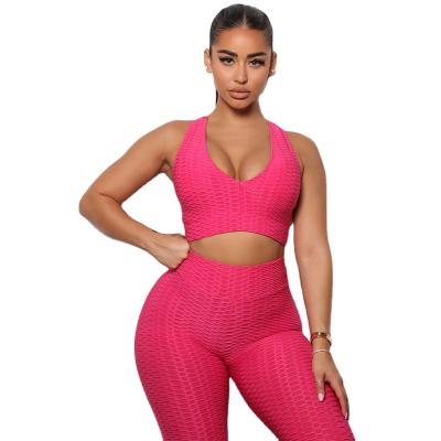 China Breathable High Quality Cross Straps V Cups Removable Deep Neck Sports Neon Pink Bra Plus Size Yoga Routine Wear for sale