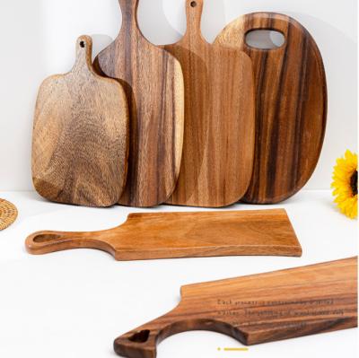 China Hot Stocked Oak Teak Laser Style Logo Bulk Kitchen Bamboo Acacia Dark Light Beech Walnut Olive Wood Cutting Cutting Board With Handle for sale