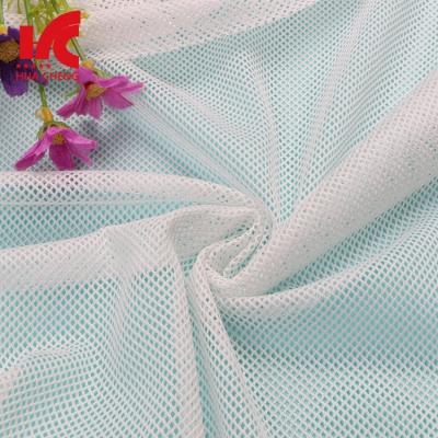 China Breathable 75D DTY Mesh Fabric For Sport Shoes Polyester Quadrilateral Mesh Fabric Anti-Static Polyester Fabric For Coating for sale