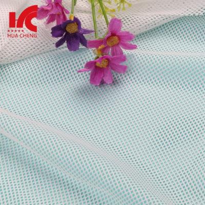 China Breathable Fine 100 Nylon Transparent Textile Wedding Mesh Fabric Eyelet for sale