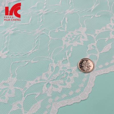 China Viable Polyester Fancy White Wedding Lace , White Bridal Lace Fabric For Wedding Dress Lace for sale