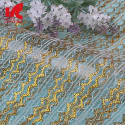 China Sustainable Raschel Gold Thin 100% Polyester Plain Bridal Lace Trim Bridal Trim for sale