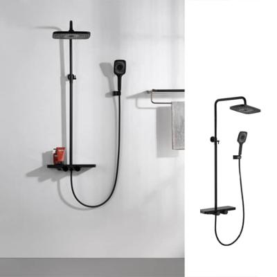 China With Black Square Slide Bar Shower Faucet Set Rain Shower Column With Shelf for sale