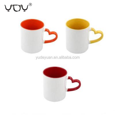 China Viable Love Heart Shape Color Handle 11oz Sublimation Color Inside Coffee Mug for sale