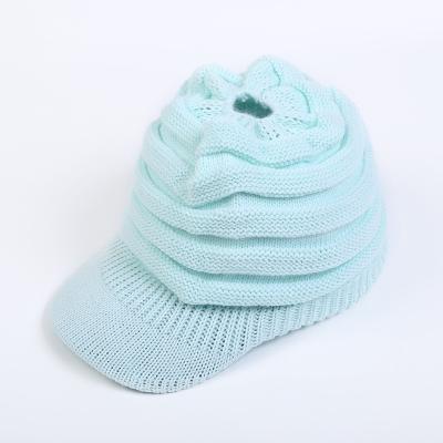 China COMMON Empty Ponytail Top Solid Winter Hat Fashion Warm Knitted Woman for sale