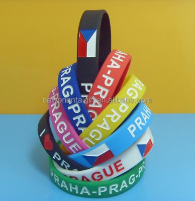 China Other Custom Debossed Country Flag Silicone Wristbands , Ink Filled Country Flag Wristband for sale