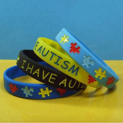 China Hot Sale Autism Awareness Silicone CLASSIC Wristbands Debossed Ink Filled Silicone Wristbands for sale