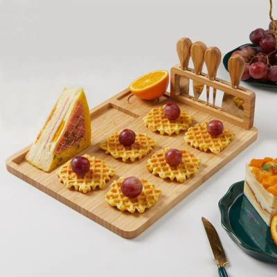 China Amazon Cheese Saddle Top Cheese Cutting Board Eco Food Sustainable Tray Single Bamboo Dish and Bamboo Knife Set for sale