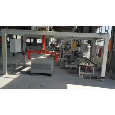 China PLC Automatic Clamp Loading Unloading Machine For Handling Industrial Handling Equipment for sale