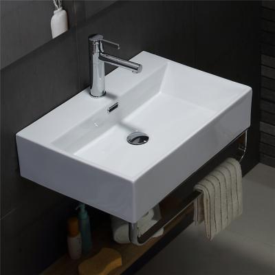 China Polished design washbrcken Keramik Moderne bathroom hanging waschbasin (with towel holder) for sale