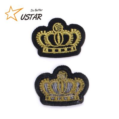 China custom 3D iron on fabric yellow crown embroidery bestseller patch for apparel for sale