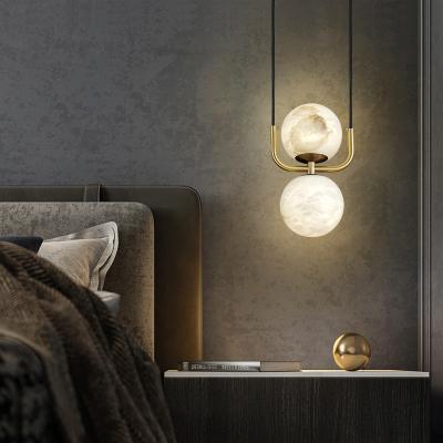 China Modern Simple Light Luxury Chandelier Designer Bedroom Restaurant Chandelier Modern Creative Simple Head Marble Bedside Long Lamp for sale