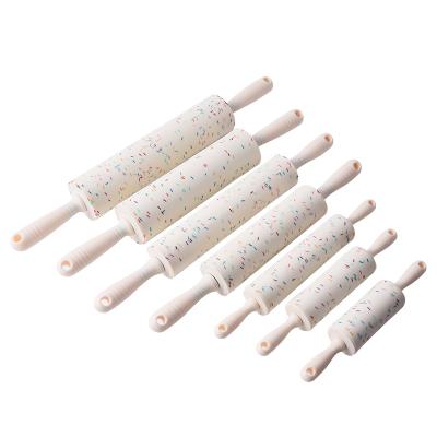 China Color Viable Particles Non-Stick Silicone Pins With Plastic Handle Pastry Tools For Kids for sale