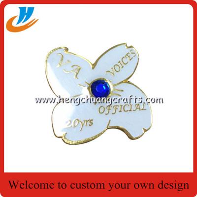 China Flower lapel pin badge custom,gold plated white logo custom metal lapel pin for sale