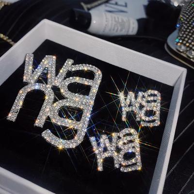 China New fashion WANG Letters Brooch Pin Korean Diamond Rhinestone Brooch Women shining exquisite brooch 2021 for sale