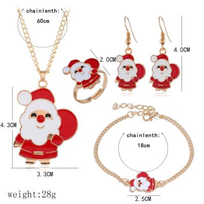 China New TRENDY Christmas 4pcs/set Deer Hat Tree Shaped Bells Snowman Ring Santa Clau Pendant Jewelry Set For Christmas Gift Party for sale