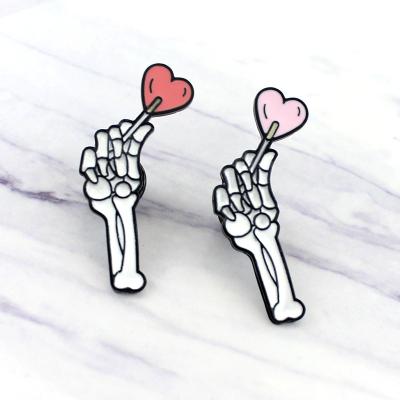 China Romantic Brooch Skull Hand Holding Love Pin Funny Happy Halloween Horror Heart Alloy Brooch Pin Red-Pink for sale