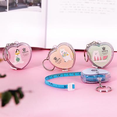 China Portable 1.5 Meter Inch Custom Soft Plastic Mini Tape Measure Cm LOGO Mini Heart Shape Key Chain For Girls for sale