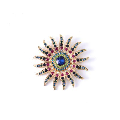 China Popular Hot Selling Gold Plated Multi Colored Glass Pave Big Sun Brooch Fashion Jewelry For Ladies for sale