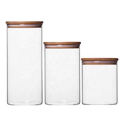 China Customized Heat Resistant Corrosion Resistant Borosilicate Glass Food Jar 450ml Cereal Storage Container With Bamboo Lid Wholesale for sale