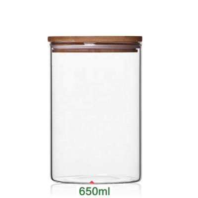 China Sustainable Relea 650ML Customized Borosilicate Glass Food Cereal Storage Tank With Bamboo Lid for sale