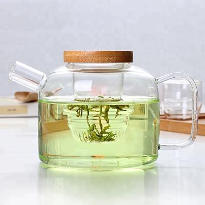 China Best Seller 750ml Borosilicate Glass Sustainable Heat Resistant Teapot With Infuser for sale