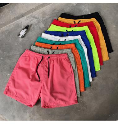 China 2021 Summer Men Logo Fashion Candy Solid Color Beach Breathable Casual Shorts Custom Made for sale