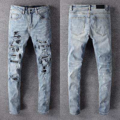 China Color Fade Proof Splash ink jeans ripped stock men dropshipping popular denim fabric men jeans for sale