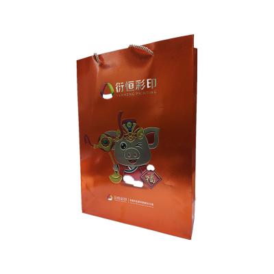 China Recyclable factory direct wholesale paper bag pattern logo portable carrier gift shopping bag for sale