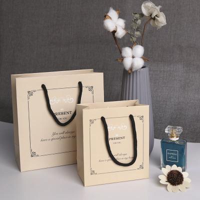 China Korean simple handmade corporate wind wholesale paper bag gift fashion logo personal printing logo printing spot for sale