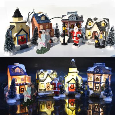 China Hot Sale Christmas Decoration Christmas Village Houses Resin Home Decoration Pieces Christmas Doll Figurine Resin for sale