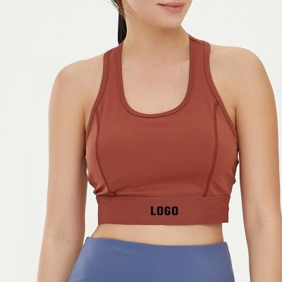 China Breathable Custom Logo Oem High Quality Recycled Push Up Backless Cross Back Women Yoga Sports Bra for sale