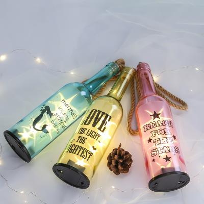 China Europe Christmas LED Party Lights Decoration Wine Bottle Glass Craft Red Wine Bottle Luminous Glass Bottle for sale