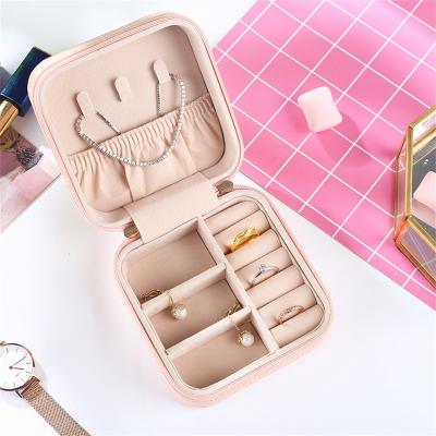 China Small Waterproof Jewelry Organizer Box for Necklace Earring Rings Bracelets Travel Jewelry Case for Women for sale