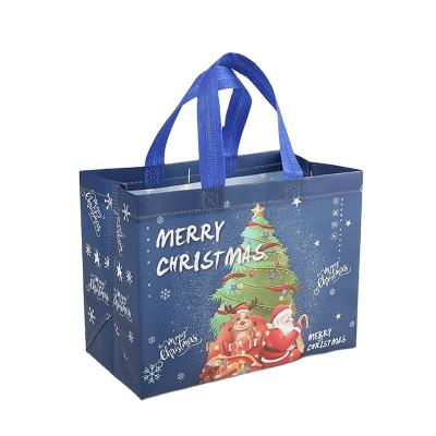 China Custom factory cartoon cgristmas festival durable beautiful gift bag wholesale eco-friendly plastic sachet for sale