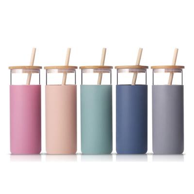 China Viable Wide Mouth Tumbler BPA Free Glass Water Bottle Travel Glass Mug with Bamboo Lid and Silicone Protective Sleeve Straw for sale