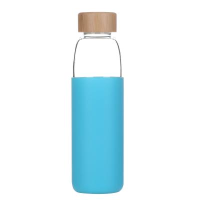 China Eco Friendly Traditional Borosilicate Safe Glass Water Bottle With Bamboo Lid And Protective Sleeve for sale