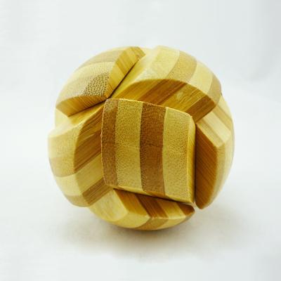 China Brain Teaser Game Puzzles Playful Football Bamboo Jigsaw Ball Bamboo Puzzle for sale