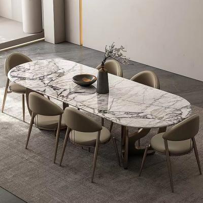 China High End Dining Table and Chair Combination (Waist) Light Adjustable Modern Natural Marble Stone Oval Stone Villa Home Dining Table for sale