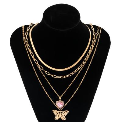 China Hiphop Vintage Hollowed Out Butterfly Love Rhinestone Pendant Necklace Layered Temperament Snake Bone Chain Necklace for sale