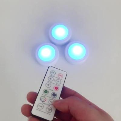 China Modern Adjustable Lighting Led Changing Puck Lights With Remote Control Smart 16 Magic Light Color Mood Pebbles for sale