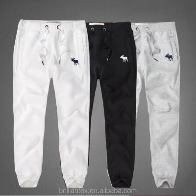 China Anti-pilling custom made yoga pants with christmas deer logos on high quality pants for men for sale